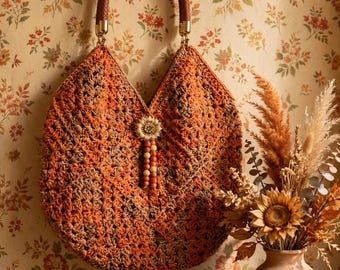 This is a very fun orange Handmade crocheted bag with sweet sunflower embellishment and fully lined, with free shipping