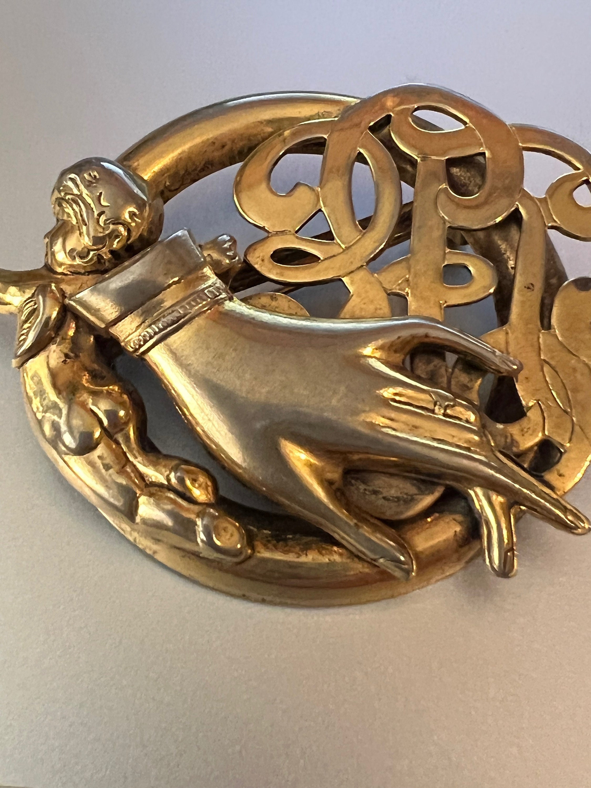 Ann Hand Brooch - Etsy