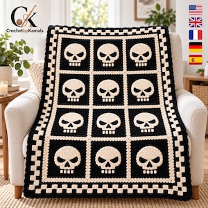 May include: A rectangular crochet blanket featuring a grid of twelve black squares, each containing a cream-colored skull motif. The blanket is bordered by a cream-colored checkered pattern and a scalloped edge, creating a high-contrast design.