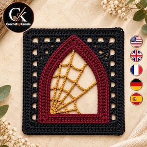 May include: A square crochet motif featuring a black border with a central pointed arch design in deep red. Inside the arch, a golden yellow yarn is worked into a web-like pattern. The piece is a flat, textile square with visible yarn stitches.