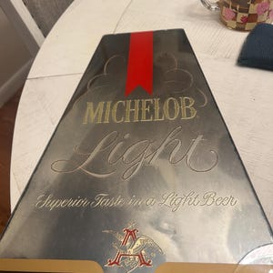 Michelob light superior taste in a light beer mirror