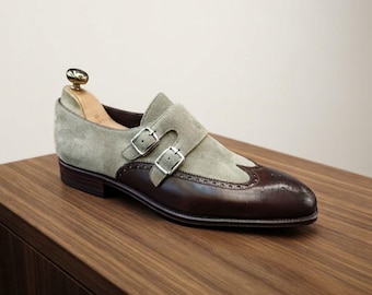 Chaussures à double boucle pour homme en daim et cuir bicolores, style brogue à bout golf.