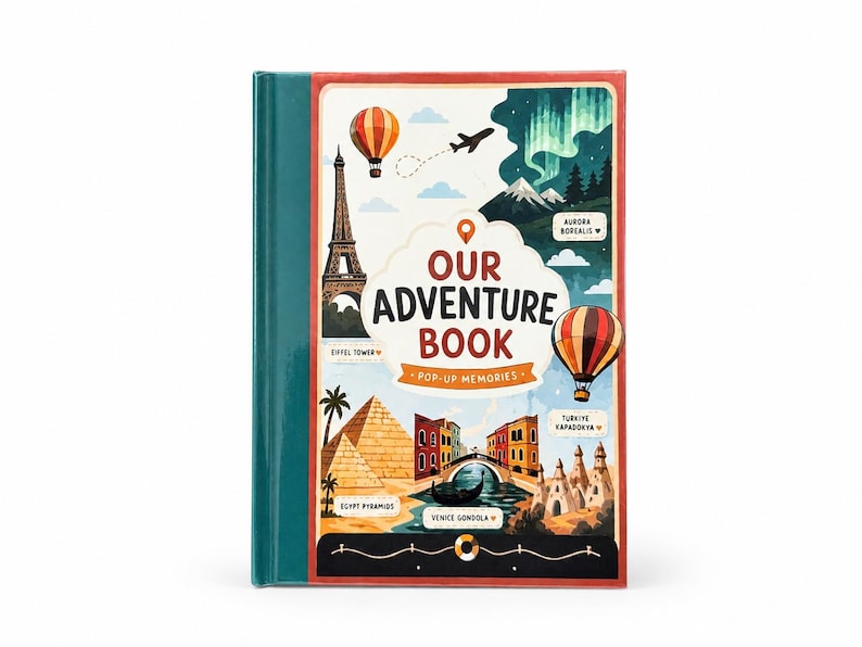 Our Adventure Book, a personalized 3D pop-up travel book with 5 destinations. The closed book cover stands beside an open page featuring a hand-illustrated Eiffel Tower, with two custom illustrated figures created from the customer's own photos standing on a cobblestone path.