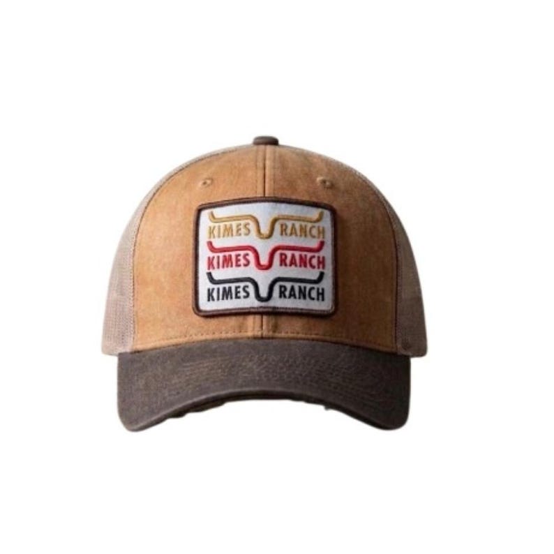 May include: A tan and dark brown baseball cap with a mesh back. The front features a rectangular patch with the text KIMES RANCH embroidered in three stacked lines, each with a unique colored outline in yellow, red, and black respectively.