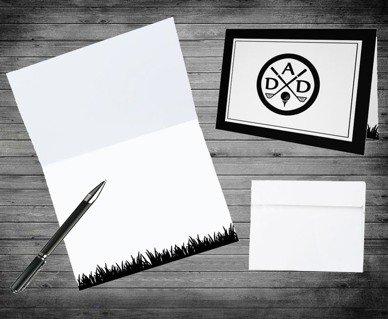 May include: A black and white card with a golf-themed design. The card features a circle with crossed golf clubs and the letters "A D D" inside. The card is on a wood background.