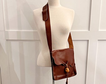 Vintage genuine leather crossbody purse, shoulder bag, cognac brown, hand stitched, leather tassel, coconnut, fall autumn fashion accessory