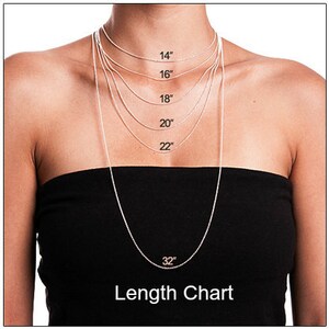May include: A necklace length chart showing various chain lengths: 14", 16", 18", 20", 22", and 32". The chart is displayed against a person's torso, with the chains illustrating how each length would hang. The text "Length Chart" is at the bottom.