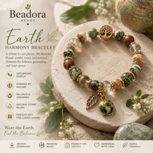 May include: A beaded bracelet featuring a mix of green, brown, and clear natural stone beads accented with gold-toned spacers. The bracelet includes a gold-toned tree charm and two dangling charms: a green leaf and a globe-patterned circular pendant.