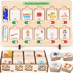 May include: A light-colored wooden daily responsibility chart featuring ten slots with illustrated task cards labeled Bath, Put Away Toys, Dinner, Bedtime, Homework, Brush Teeth, Wash Face, Breakfast, Toilet, and Coats On, with sliding toggles.