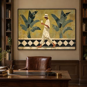 May include: A framed wall art print featuring a stylised illustration of a person in a hat and patterned clothing walking between two large tropical plants. The background is a muted yellow with a black and white diamond pattern along the bottom edge.