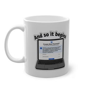 Może przedstawiać: Biały ceramiczny kubek z grafiką otwartego laptopa wyświetlającego ekran tworzenia hasła. Tekst nad laptopem brzmi "And so it begins", a na ekranie wymieniono humorystyczne wymagania, w tym kroplę krwi jednorożca.