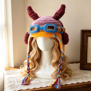Bonnet aviateur trappeur à cornes crocheté à la main, bonnet d'hiver à cache-oreilles bicolores