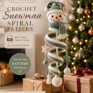 May include: A crochet snowman spiral hanging ornament featuring a green and cream colour scheme, a snowman head with a hat, a scarf, and dangling snowflake and ball accents. Text includes Belle Coco Crochet, Crochet Snowman Spiral Pattern.