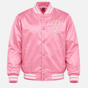 May include: A bright pink satin varsity jacket featuring a white striped ribbed collar, cuffs, and hem. The jacket has a front snap-button closure and an embroidered white script monogram of the letters PL on the upper left chest area.