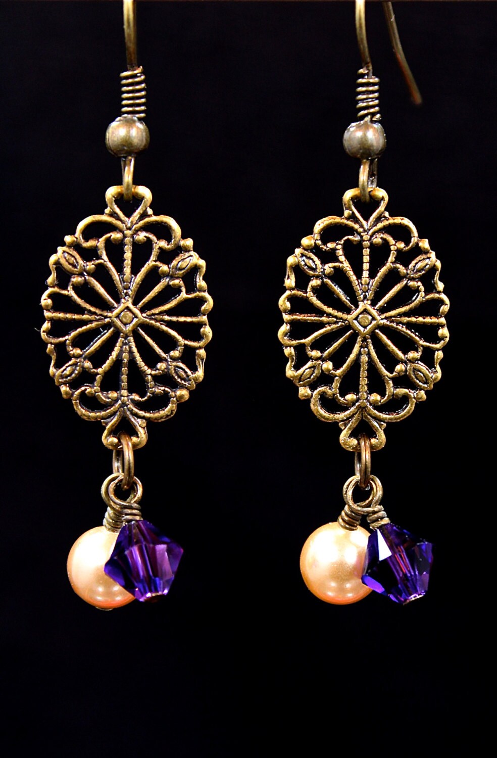 Antiqued brass and pearl earrings. Etsy