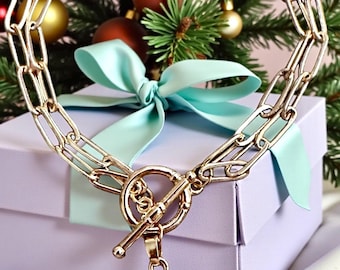 Double strand gold paperclip chain toggle bracelet with lovely mother of pearl 4 leaf clover charm