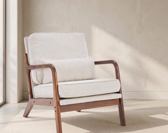 May include: An armchair featuring a dark brown wooden frame with angled armrests and legs. The seat, backrest, and a rectangular lumbar pillow are upholstered in a light cream-colored fabric, providing a structured and cushioned seating area.
