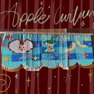 May include: A beaded curtain featuring a light blue and dark blue striped background with a repeating pattern of apple slices and cores. The curtain is suspended from a wooden rod and includes the handwritten text Apple Curtain at the top.