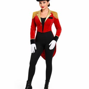 May include: A ringmaster costume featuring a red velvet tailcoat with gold lapels and gold fringe epaulets, a black bodysuit, white gloves, a black top hat, and black lace-up boots. The tailcoat has a single gold button closure and black cuffs.