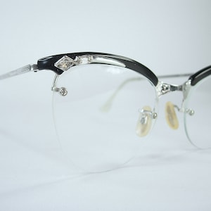 Shuron Jeweled Cat Eye Eyeglass Frames Black Plastic Brows Silver Tone  1/10 12K GF Semi-Rimless Rhinestones New Old Stock SMALLER Fit
