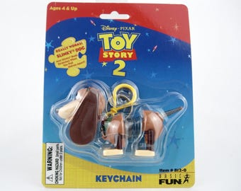 Llavero vintage de Slink de Toy Story 2 de Disney, 1999, de Basic Fun, nuevo, sin usar.