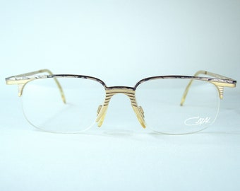 Vintage Cazal New Old Stock Montature per occhiali semi-rimless Made in Germany Metallo tono oro Argento nero marmorizzato motivo