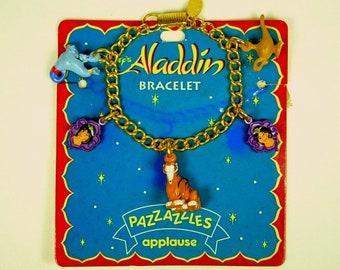 Aladdin  Vintage Charm Bracelet Jasmine Rajah Genie Lamp Applause Pazzazzles New Old Stock NOS PVC or Resin Charms Gold Tone Metal Disney