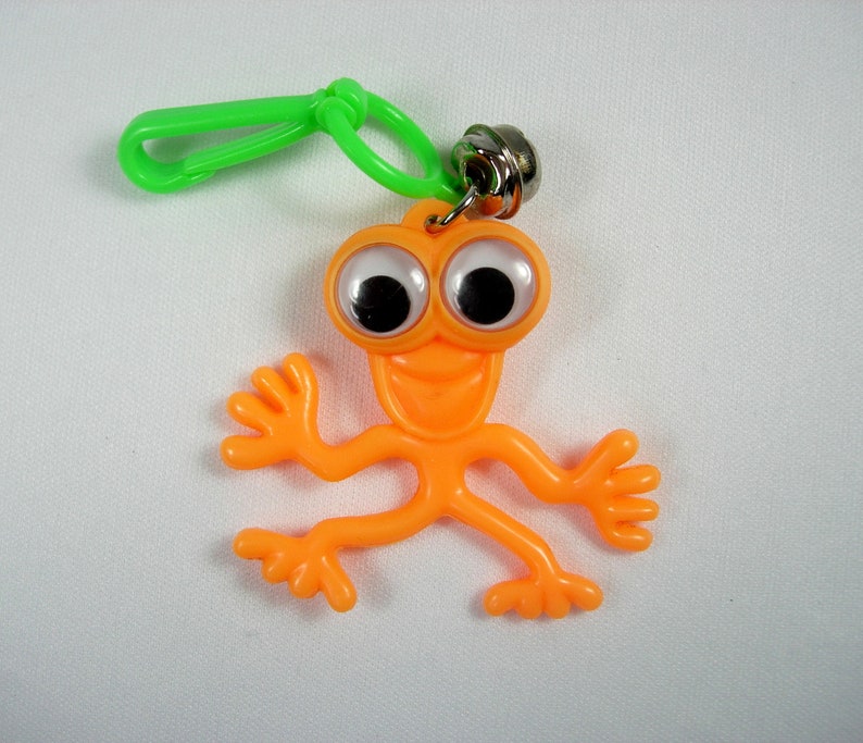 Plastica Bell Charm True Vintage Neon Arancione Strano Googly Eyed Creature Monster Alien 80s Fad Nostalgic immagine 1