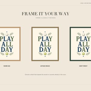May include: Three framed art prints featuring the text PLAY ALL DAY in green and blue, accented by a white ball and a yellow tennis ball with leaf illustrations. The frames are labeled as Warm Oak, Antique Brass, and Deep Forest finishes.