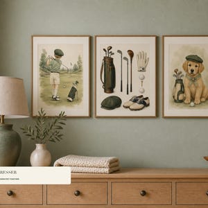 Three framed golf prints hang above a wooden dresser holding a lamp and decor.