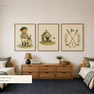Three framed golf nursery prints hung in a row above a wooden dresser between two twin beds.
