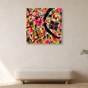 A minimalist living space featuring a single square abstract art print centered on a plain wall above a neutral bench.