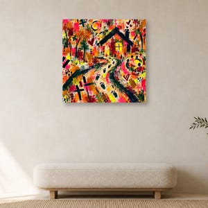A minimalist interior featuring a cream bench against a neutral wall with a single square colorful abstract art print centered above it.