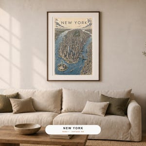 May include: A framed vertical art print featuring an aerial illustration of New York City, including the Statue of Liberty and Manhattan skyline, with the text NEW YORK at the top. The artwork uses a palette of blue, beige, and muted earth tones.