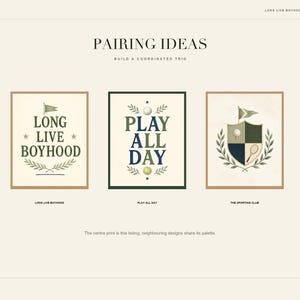 May include: Three rectangular art prints featuring sports-themed illustrations. The left print says LONG LIVE BOYHOOD with a flag and laurel. The center print says PLAY ALL DAY with a ball. The right print shows a shield crest with a tennis racket.