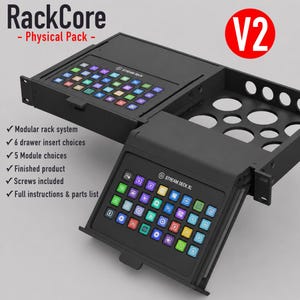 May include: A black RackCore V2 physical rack system featuring two integrated Stream Deck units with colorful backlit keys. The modular assembly includes a drawer insert, five module options, mounting screws, and a full instruction set.