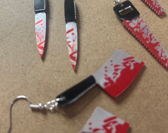 Pendientes colgantes de cuchilla ensangrentada: joyería de terror