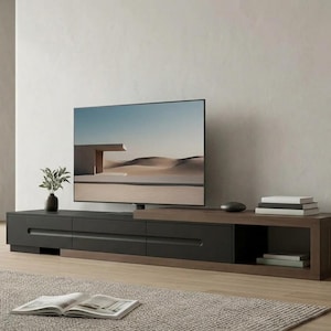 May include: A low-profile media console featuring a combination of dark charcoal gray drawers and a rich brown wood frame. The unit includes three horizontal drawers with recessed handles and an open shelving section on the right side.