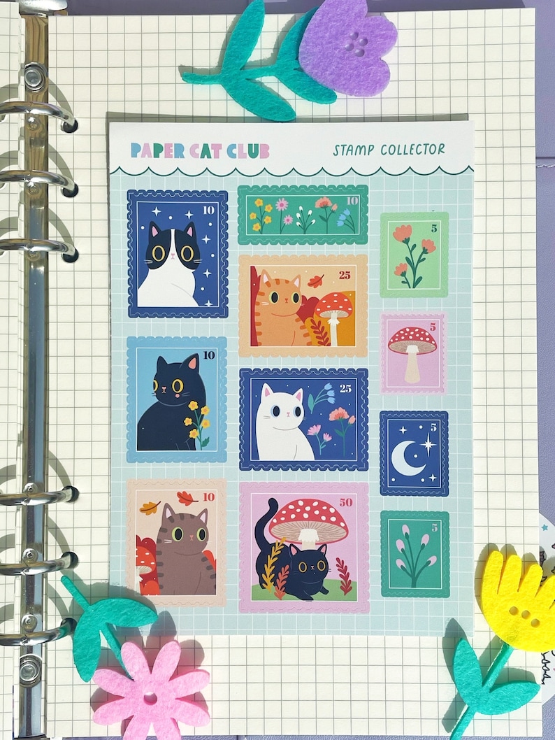 A sheet of A6 matte stickers featuring cats amongst wildflowers in a stamp-like design.