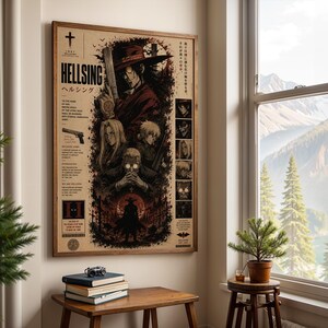 May include: A framed Hellsing anime poster featuring a dark, detailed illustration of characters including Alucard in a red hat and coat, with Japanese and English text, displayed on a wall above a wooden table with stacked books.
