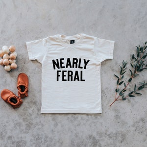 Nearly Feral Baby and Kids Tee Funny Organic Cotton Graphic Tee for Wild Little Ones Feral Kids T-Shirt in Natural FREE SHIPPING image 1