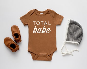 Total Babe Organic Baby Bodysuit • Modern GOTS Certified Baby Outfit • Unique Trendy Typographic Hand-Printed Bodysuit in Rusty Camel Brown