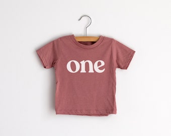 One Modern First Birthday Baby and Kids Tee in Mauve • Modern Typographic Style Tee for Trendy Little One Year Olds • First Birthday Shirt