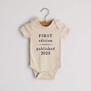 First Edition Published 2025 or 2026 Vintage Book Page Organic Baby Bodysuit • Modern Neutral Baby Outfit • Hand-Printed Bodysuit in Cream