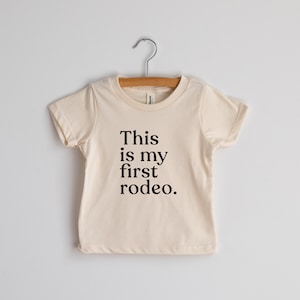 This Is My First Rodeo Organic Baby T-Shirt • Modern Graphic Baby Tee • Natural Organic Cotton Cream Tee • USA Made Organic Baby Top