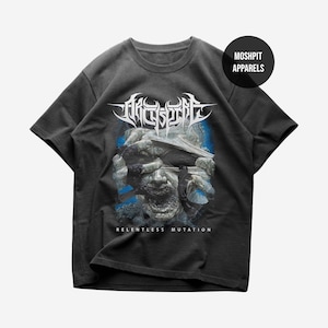 May include: A charcoal gray short-sleeve t-shirt featuring a white Archspire logo at the top and the text Relentless Mutation at the bottom. The central graphic depicts a detailed, distressed face being pulled apart by hands, set against a blue background.