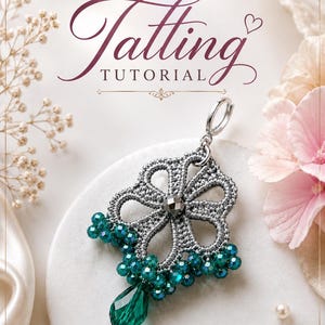 May include: A tatting tutorial guide featuring a silver-toned lace flower pendant adorned with emerald green crystal beads and a teardrop-shaped green crystal drop. The text reads Balungra Shop, Tatting Tutorial, and Step-by-step guide to create your own tatting jewelry.