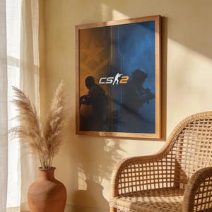 May include: A square wall art print in a light wood frame featuring the CS2 logo in the centre. The artwork is split vertically between an orange side with a star and a blue side, both displaying silhouettes of soldiers in tactical gear.