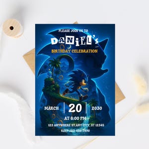 May include: A rectangular birthday invitation card featuring a blue Sonic the Hedgehog theme. The text reads: PLEASE JOIN US TO DANIEL'S BIRTHDAY CELEBRATION, MARCH 20 2030 AT 8:00 PM, 123 ANYWHERE ST.ANY CITY, ST 12345, RSVP+123-456-7890.