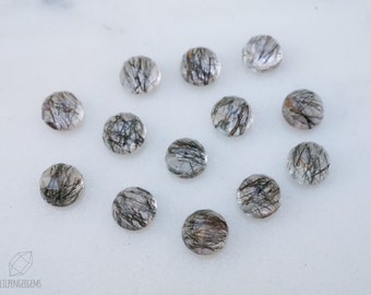 6mm black rutile faceted cabochon. black and white rutilated quartz. patterned gemstone rose cut